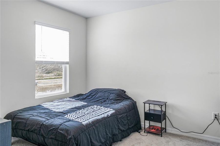 Furnished interior view inside a new home in Eagle Hammock, Eagle Lake (Image 26).