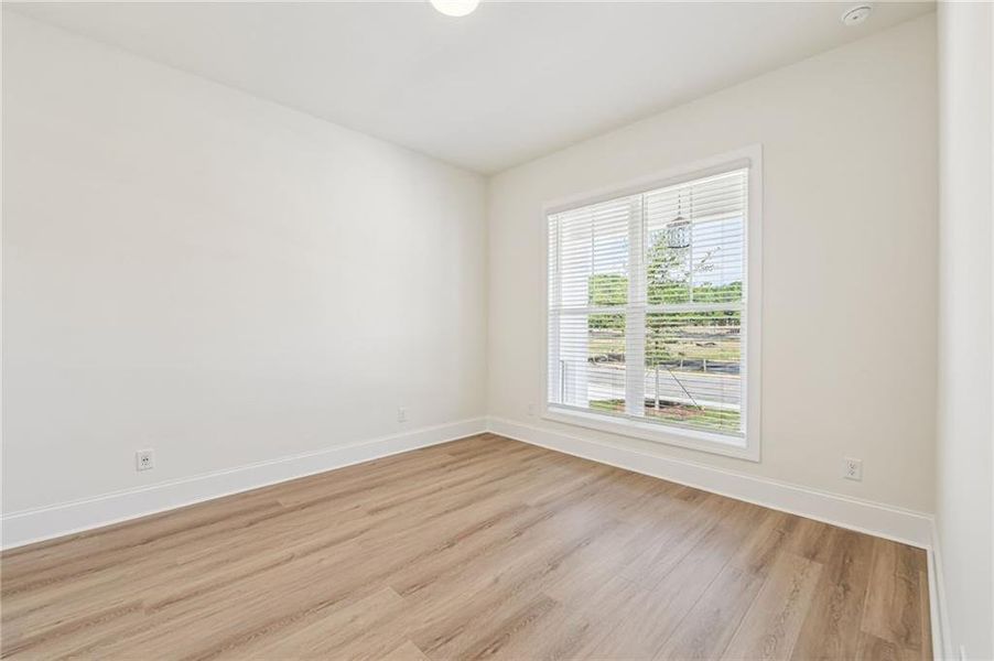 Spacious, unfurnished interior of a new home in Waterhaven, Cumming (Image 22).
