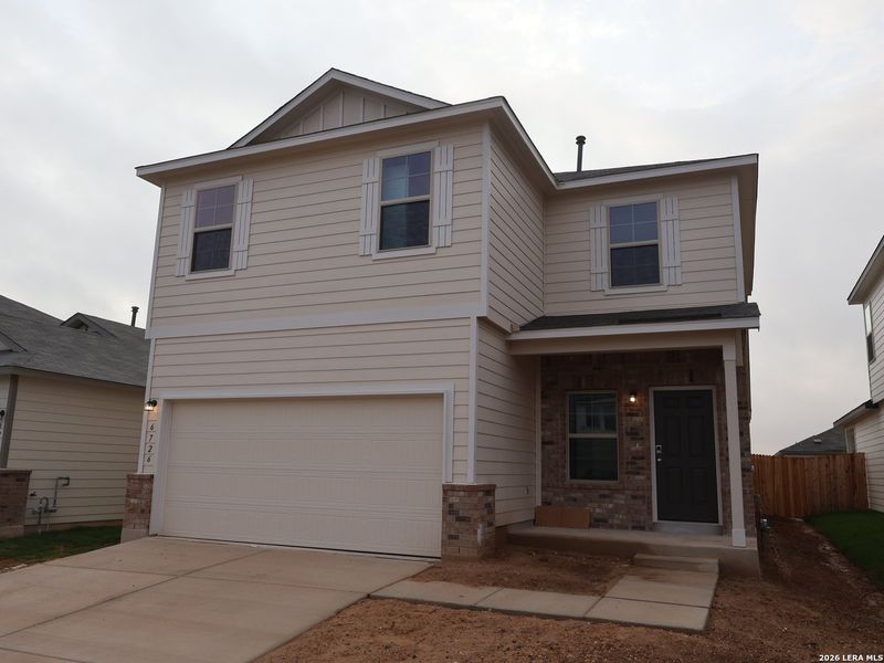 Front exterior of a new home in Winding Brook, San Antonio, TX, highlighting curb appeal (Image 20). Front exterior of a new home in Winding Brook, San Antonio, TX, highlighting curb appeal (Image 20).