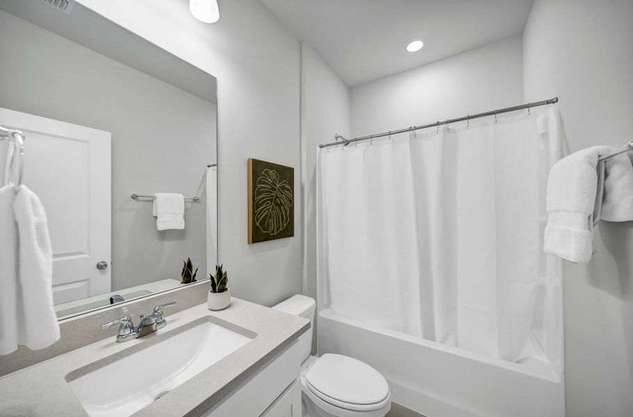 Furnished interior view inside a new home in Monroe Preserve, Chapin (Image 58).