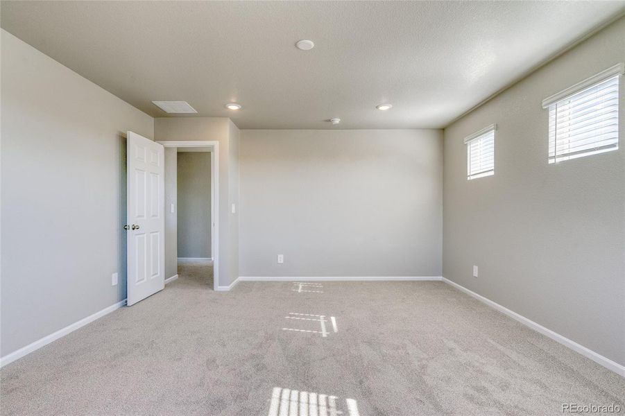 Spacious, unfurnished interior of a new home in Buffalo Highlands: The Flora Collection, Commerce City (Image 32).