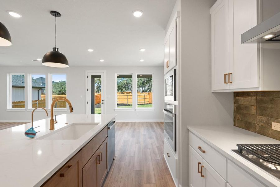 Furnished interior view inside a new home in Terrace Collection at Heritage, Dripping Springs (Image 9).