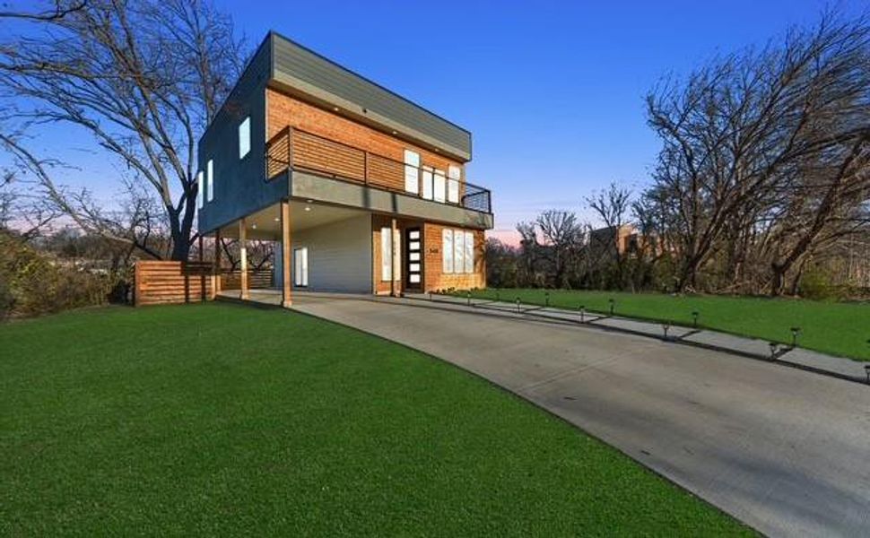 Front exterior of a new home in , Dallas, TX, highlighting curb appeal (Image 23).