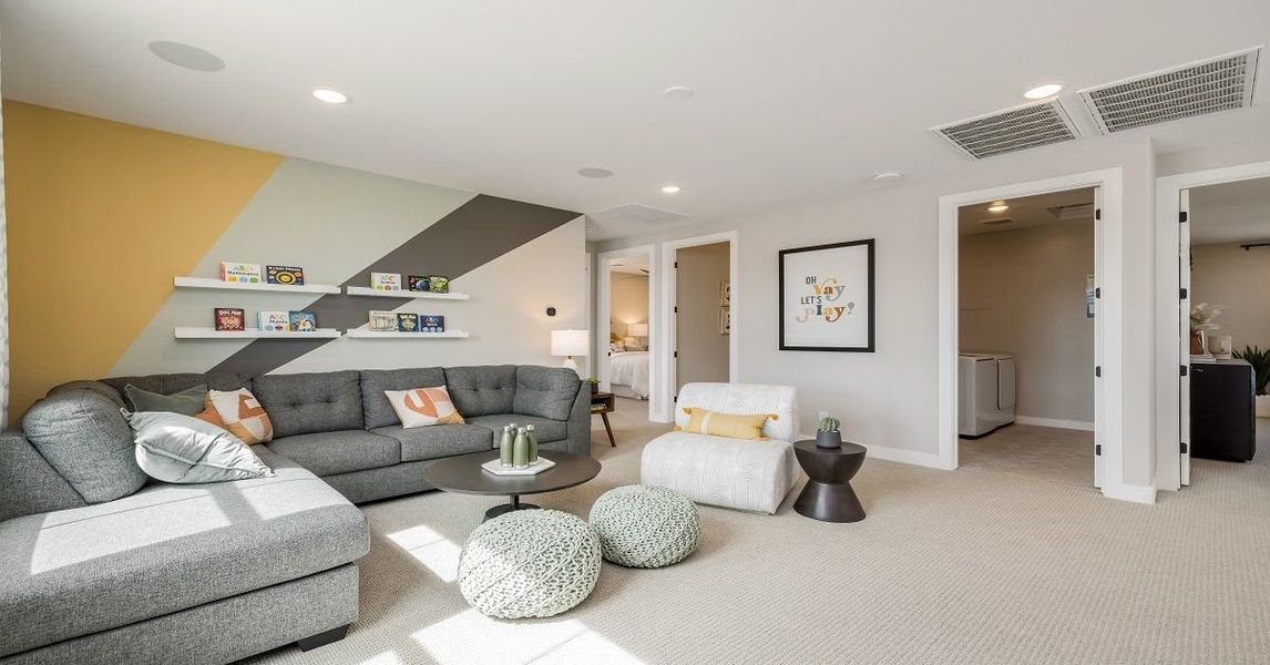 Representative furnished interior of a home built from the Camelback by William Ryan Homes in Alta Vida at Westpark, Buckeye (Image 31).