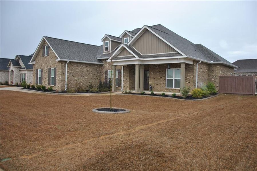 Front exterior of a new home in , Kathleen, GA, highlighting curb appeal (Image 24).
