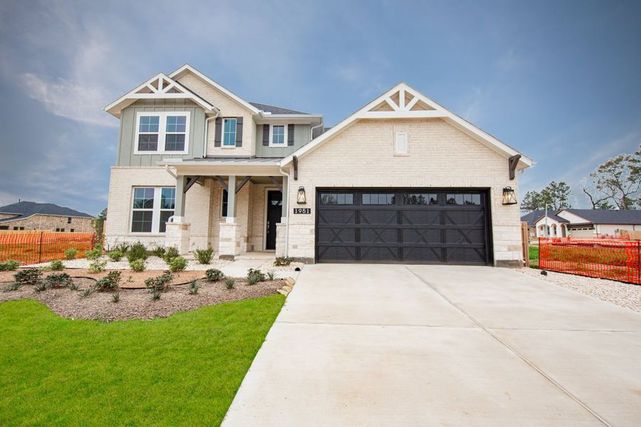 Front exterior of a new home in COLTON, Montgomery, TX, highlighting curb appeal (Image 1). Front exterior of a new home in COLTON, Montgomery, TX, highlighting curb appeal (Image 1).