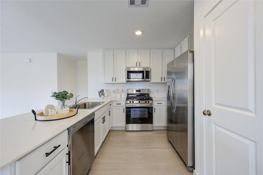 Modern kitchen with ample cabinet space and functional layout