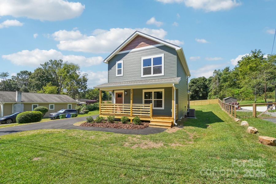 Front exterior of a new home in , Asheville, NC, highlighting curb appeal (Image 21).