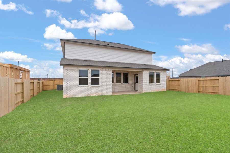 This backyard is perfect for family gatherings, social events, or simply unwinding in the fresh air.