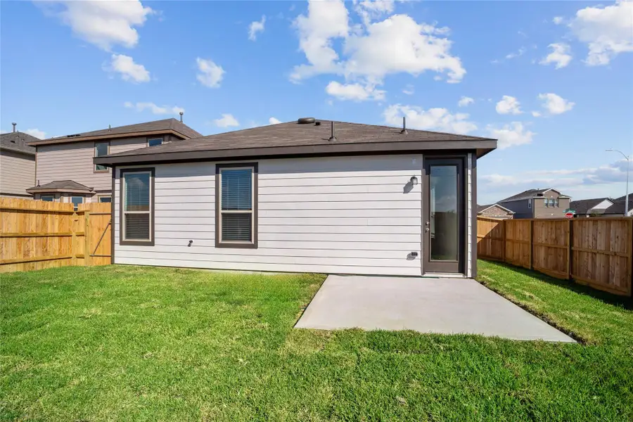 Come explore this generous backyard with patio slab—perfect for kids to play freely and adults to unwind in comfort! Come explore this generous backyard with patio slab—perfect for kids to play freely and adults to unwind in comfort!