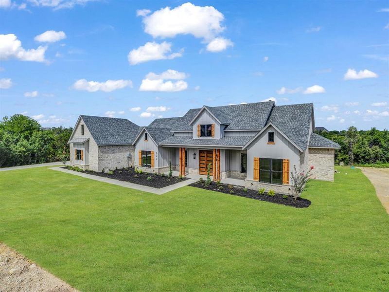 Front exterior of a new home in , Weatherford, TX, highlighting curb appeal (Image 4). Front exterior of a new home in , Weatherford, TX, highlighting curb appeal (Image 4).