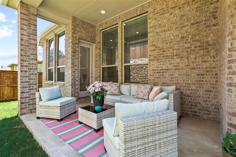 Expanded covered patio is the perfect spot for morning coffee or evening glass of wine Expanded covered patio is the perfect spot for morning coffee or evening glass of wine
