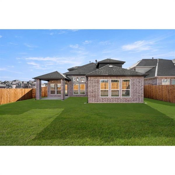 Front exterior of a new home in The Villages at Charleston, Glenn Heights, TX, highlighting curb appeal (Image 19).