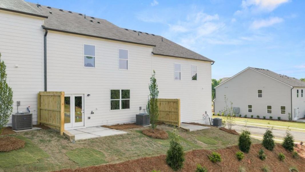 Exterior details and patio area of a home in Village at Pine Valley, Gainesville (Image 3).