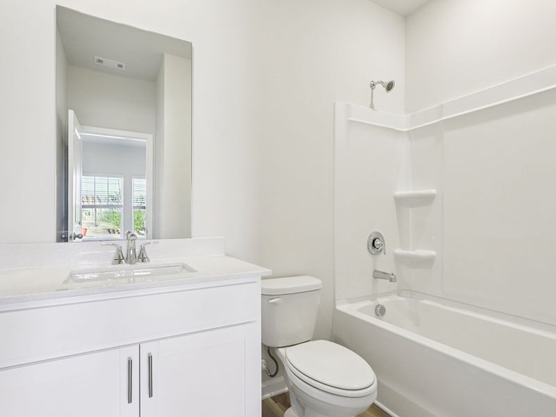 Furnished interior view inside a new home in Moss Farms, Lula (Image 8).