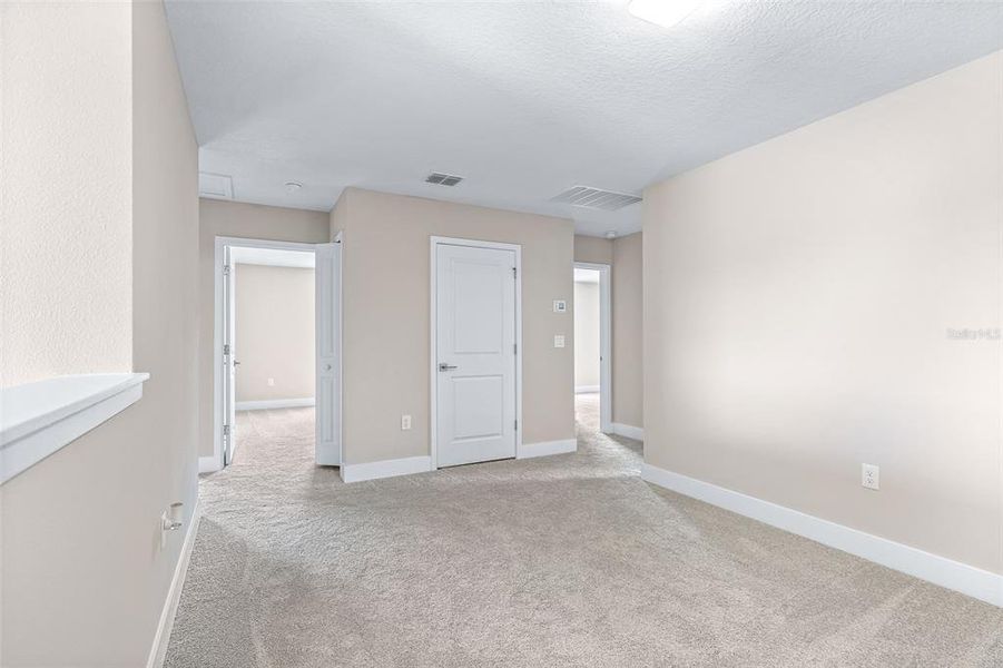 Spacious, unfurnished interior of a new home in Gray Hawk at Hole Two, Daytona Beach (Image 50). Spacious, unfurnished interior of a new home in Gray Hawk at Hole Two, Daytona Beach (Image 50).