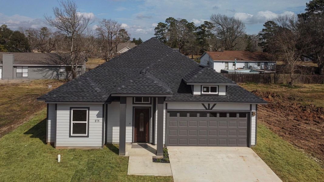 Front exterior of a new home in , Livingston, TX, highlighting curb appeal (Image 25). Front exterior of a new home in , Livingston, TX, highlighting curb appeal (Image 25).