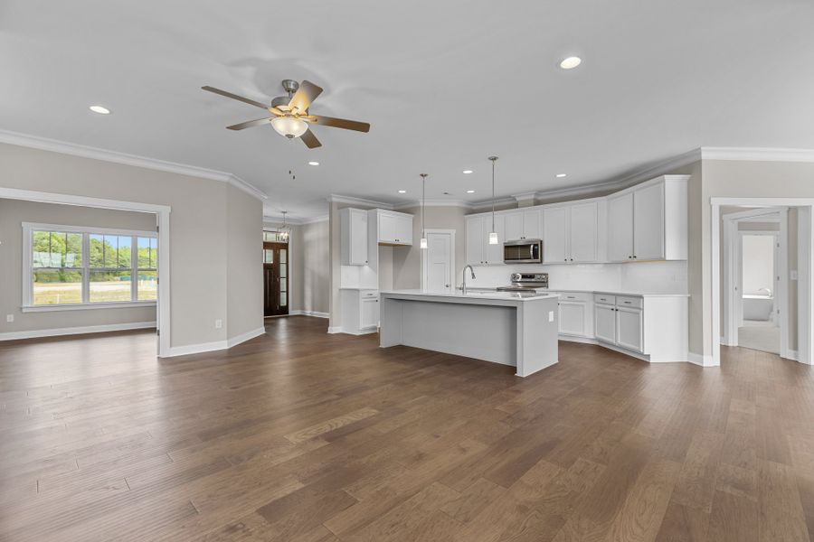 Furnished interior in a model home at Kensington at Paramore in Winterville (Image 19).