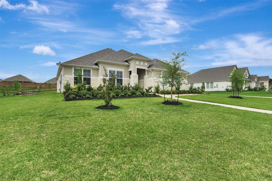 Front exterior of a new home in Lone Star Landing, Montgomery, TX, highlighting curb appeal (Image 22).