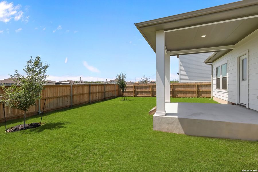 Exterior details and patio area of a home in The Parklands, Schertz (Image 25).