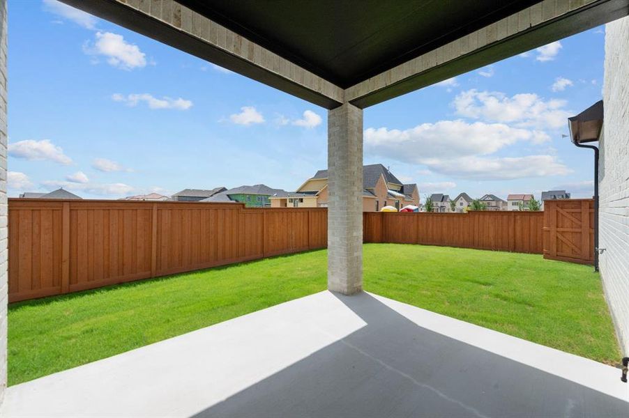 View of patio / terrace featuring a fenced backyard and a residential view