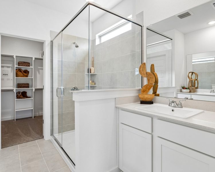 Primary Bathroom in the Magnolia home plan by Trophy Signature Homes – REPRESENTATIVE PHOTO Primary Bathroom in the Magnolia home plan by Trophy Signature Homes – REPRESENTATIVE PHOTO