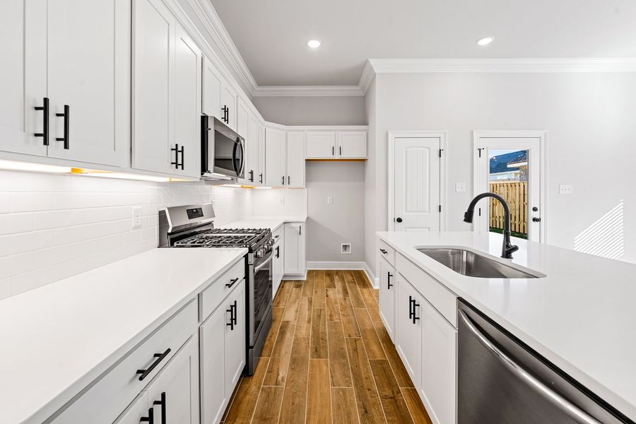 Furnished interior view inside a new home in The Bluffs at Lafayette, Freeport (Image 6).