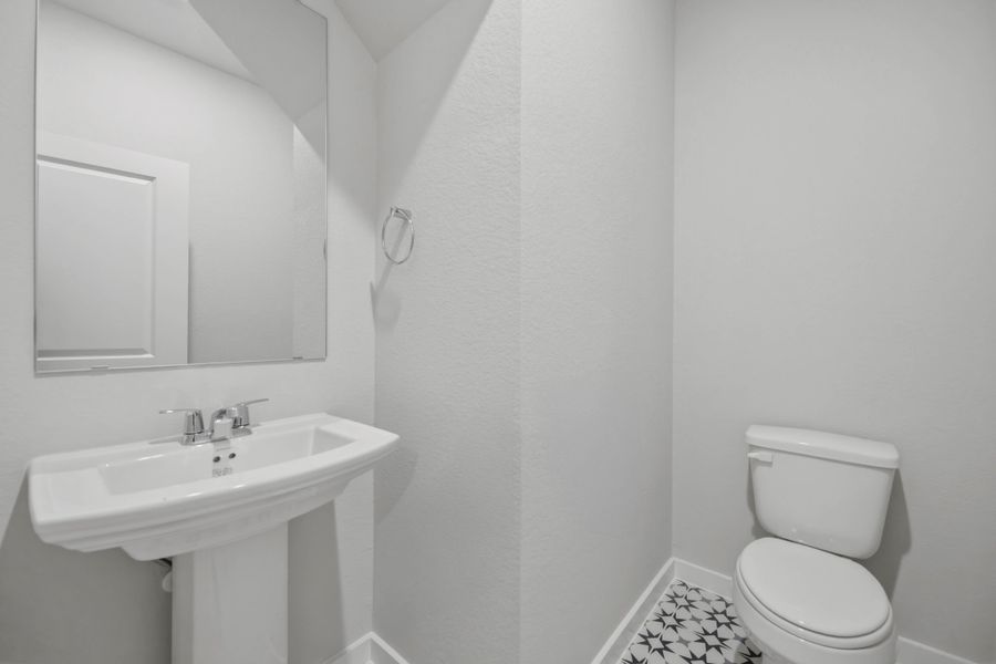 Furnished interior view inside a new home in Sunterra 40, Katy (Image 10).