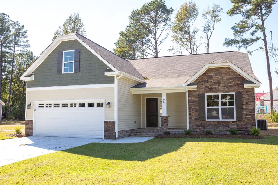 Representative exterior photo of a completed home built from the Wyatt by Bill Clark Homes in Davenport Farms, Winterville, NC (Image 27).