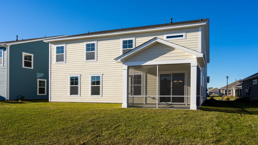 Exterior details and patio area of a home in Indigo Preserve, Leland (Image 21).