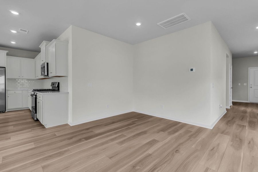 Spacious, unfurnished interior of a new home in Horizons at Summers Corner | 55+: The Cottages, Summerville (Image 16). Spacious, unfurnished interior of a new home in Horizons at Summers Corner | 55+: The Cottages, Summerville (Image 16).