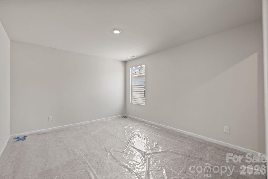 Spacious, unfurnished interior of a new home in McFarland Estates, York (Image 28).