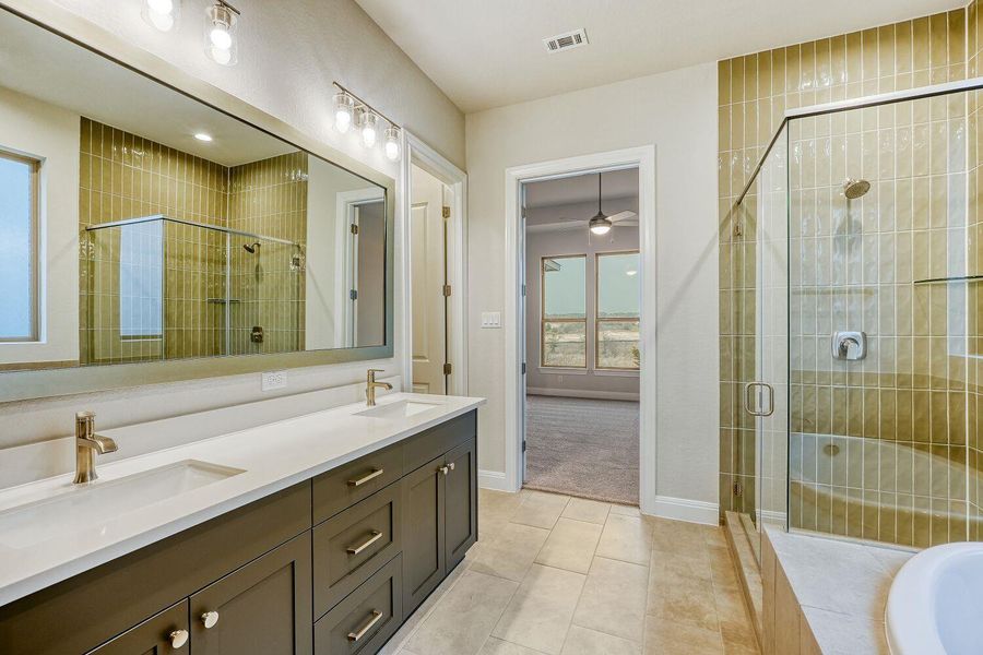 Furnished interior view inside a new home in 6 Creeks, Kyle (Image 6).