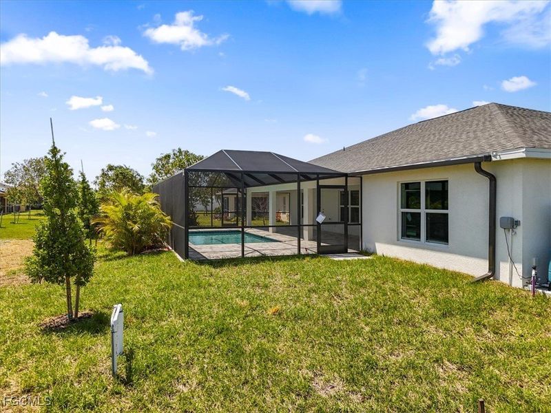 Front exterior of a new home in Cape Coral, Cape Coral, FL, highlighting curb appeal (Image 21).