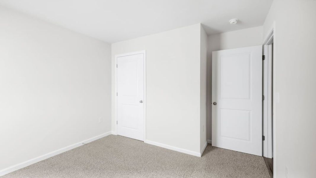 Spacious, unfurnished interior of a new home in Ravencrest, Roebuck (Image 25).