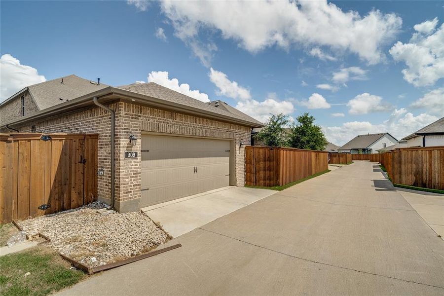 Exterior details and patio area of a home in Karis - Village Series, Crowley (Image 24).