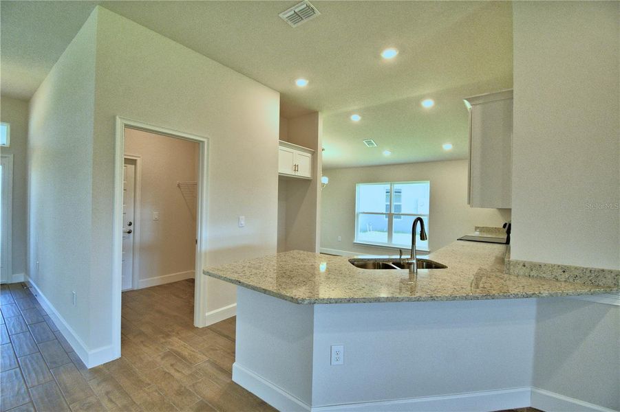 Furnished interior view inside a new home in Lake Juliana Estates, Auburndale (Image 6).