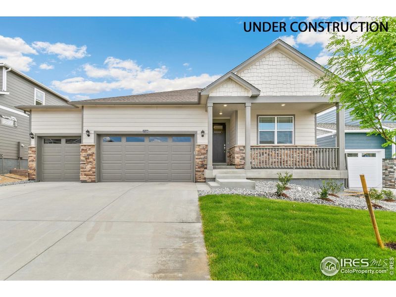 Front exterior of a new home in Tailholt, Severance, CO, highlighting curb appeal (Image 1).
