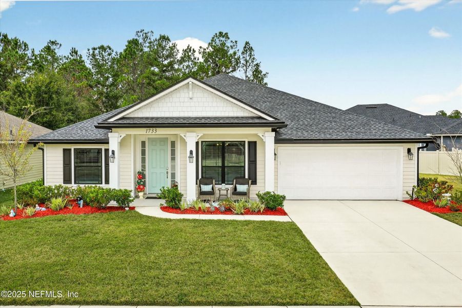 Front exterior of a new home in , Middleburg, FL, highlighting curb appeal (Image 1). Front exterior of a new home in , Middleburg, FL, highlighting curb appeal (Image 1).