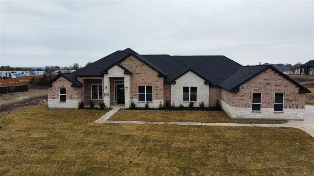 View of front facade with a front lawn