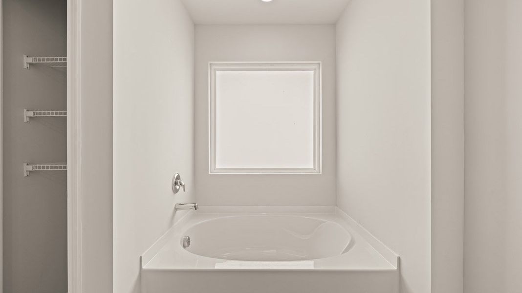 Representative furnished interior of a home built from the Grayson by D.R. Horton in Highland Hills, Graniteville (Image 9).