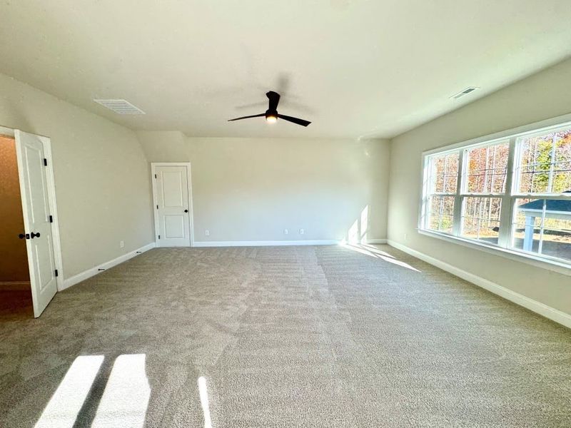 2 story home with a first floor main bedroom