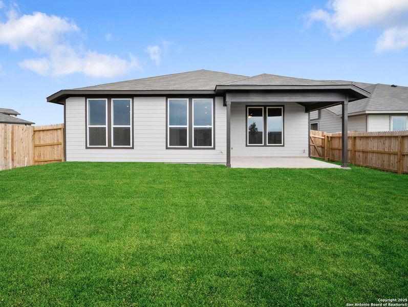 Front exterior of a new home in Morgan Meadows, San Antonio, TX, highlighting curb appeal (Image 2).