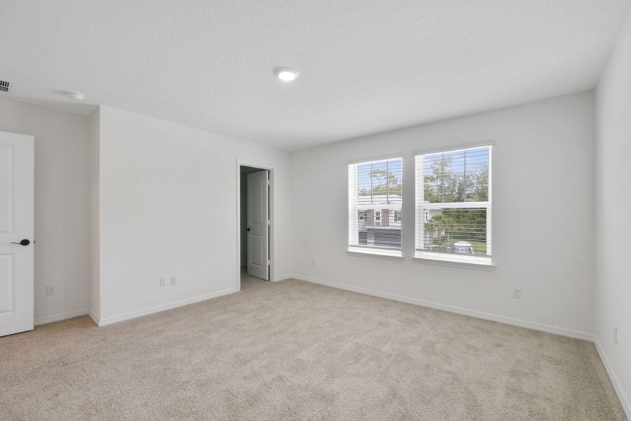 Spacious, unfurnished interior of a new home in Towns at Riverwalk, Sanford (Image 20). Spacious, unfurnished interior of a new home in Towns at Riverwalk, Sanford (Image 20).