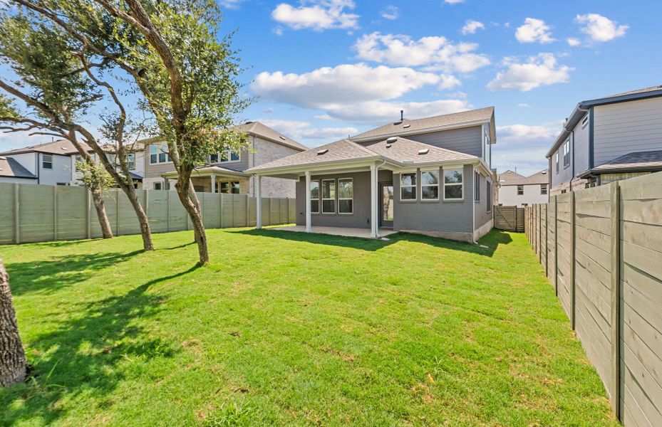 Exterior details and patio area of a home in Wolf Ranch, Georgetown (Image 3).