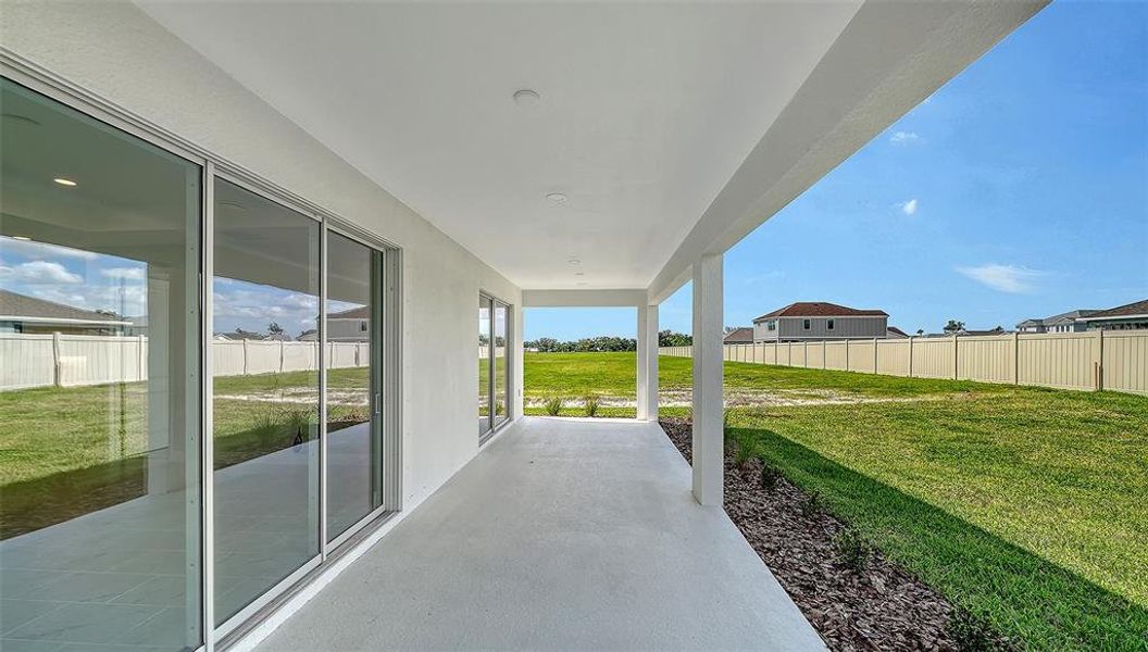 Exterior details and patio area of a home in Canoe Creek, Parrish (Image 24).