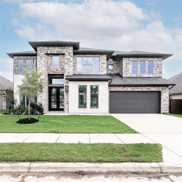 Front exterior of a new home in Juniper Springs, Lockhart, TX, highlighting curb appeal (Image 2). Front exterior of a new home in Juniper Springs, Lockhart, TX, highlighting curb appeal (Image 2).
