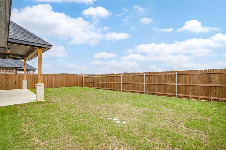 Exterior details and patio area of a home in , Benbrook (Image 24).