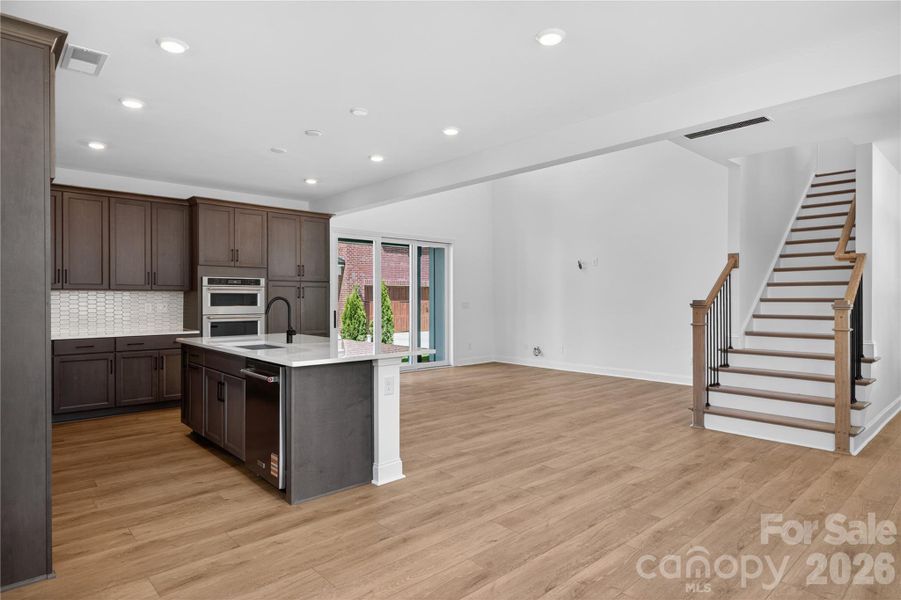 Kitchen view to two story great room
