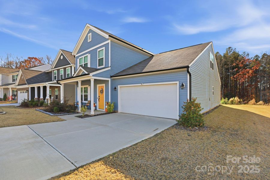Front exterior of a new home in , Statesville, NC, highlighting curb appeal (Image 1).
